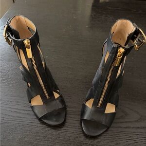 Michael Kors Black Strappy Zip-Front Heeled Sandals with Gold Hardware
